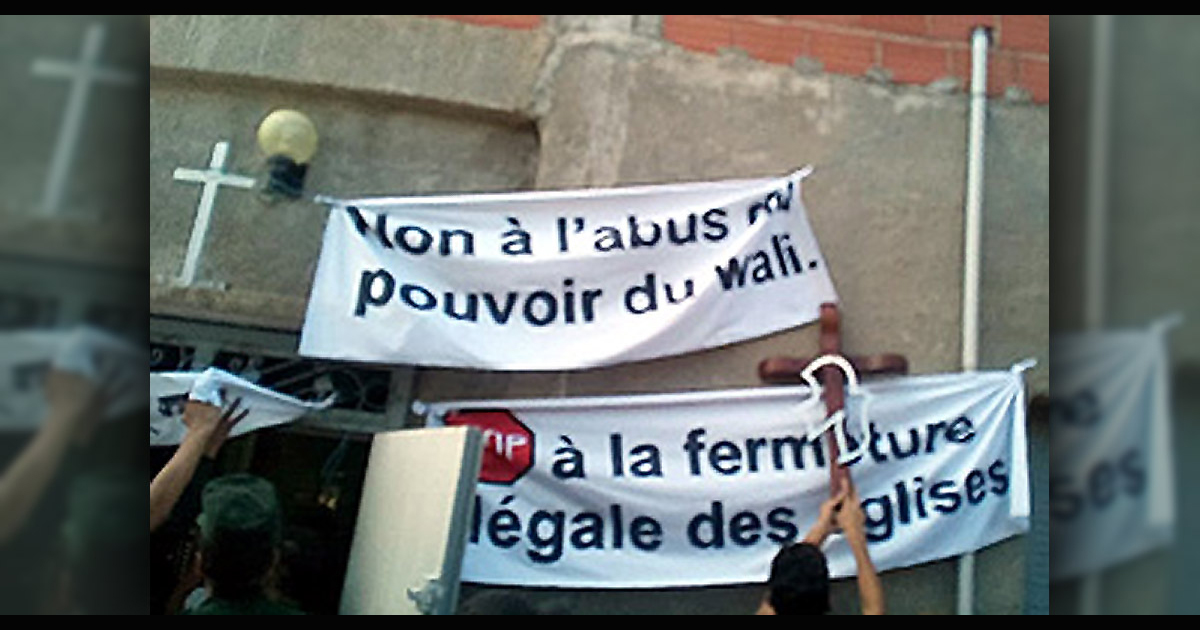 Signs protesting illegal church closures