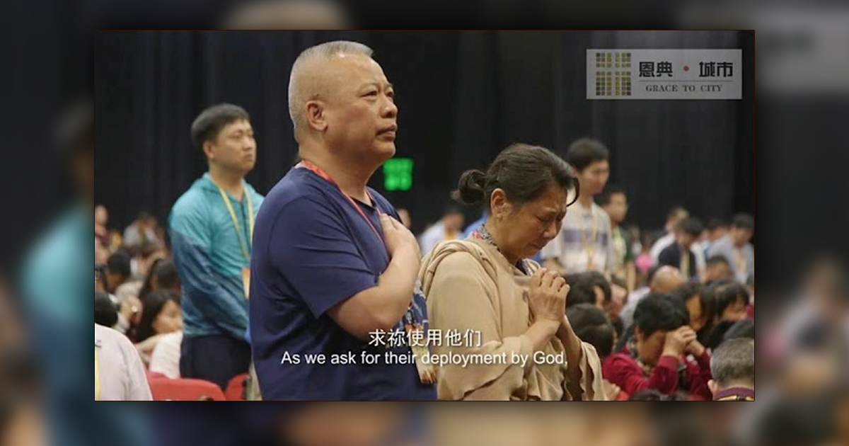 Elder Zhang with other worshippers