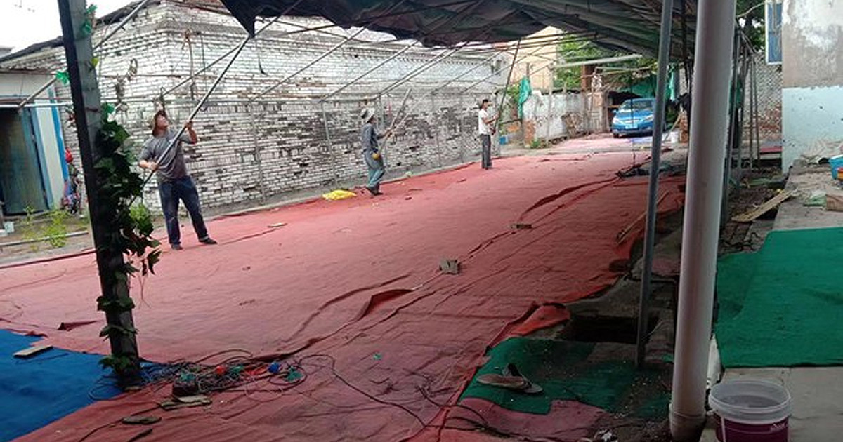 Destruction in progress at church in Youtong.