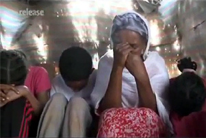 Eritrean family praying - Photo: Release International www.releaseinternational.org