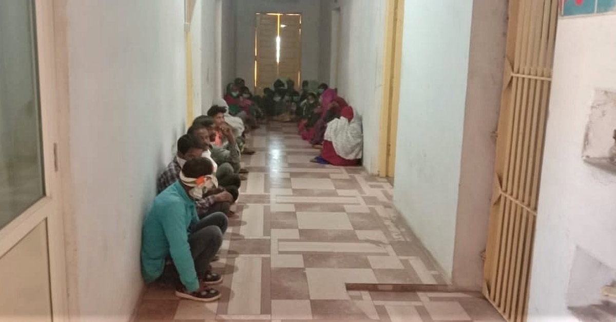 Christians sitting in a hallway - Photo: Morning Star News