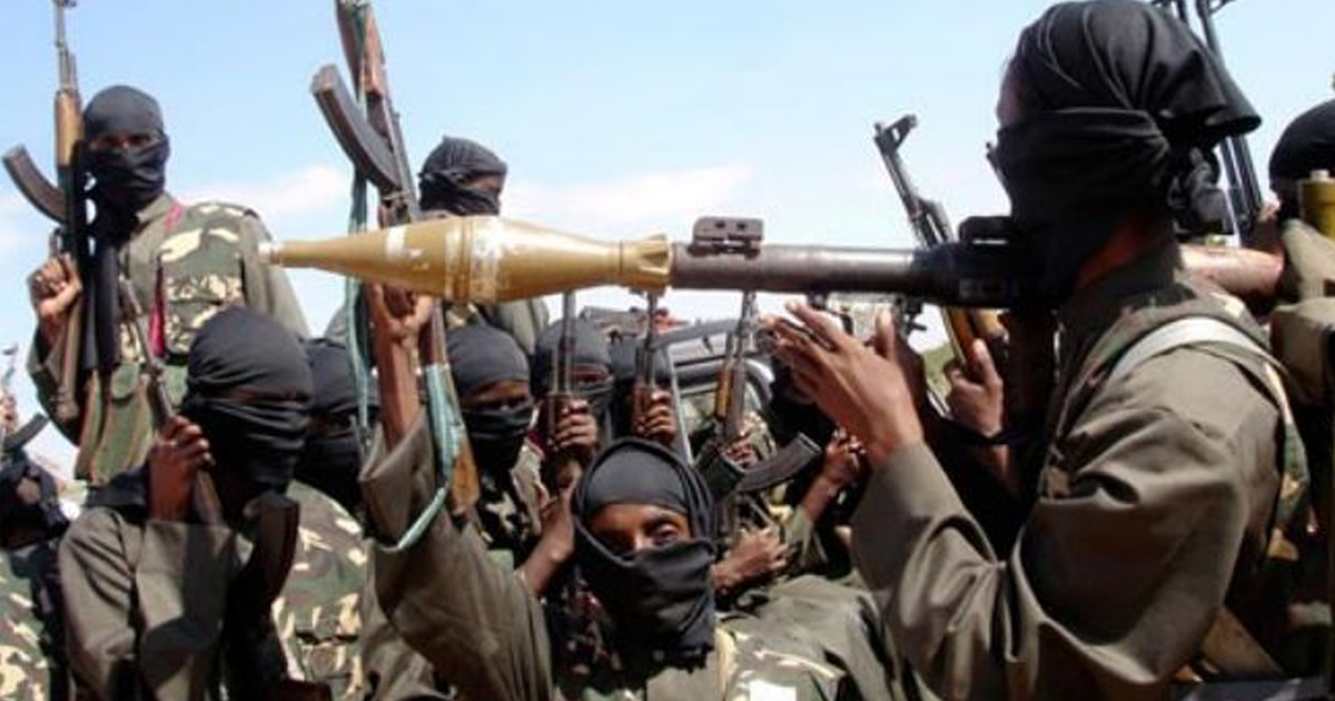 Masked Boko Haram fighters are holding various types of weaponry.