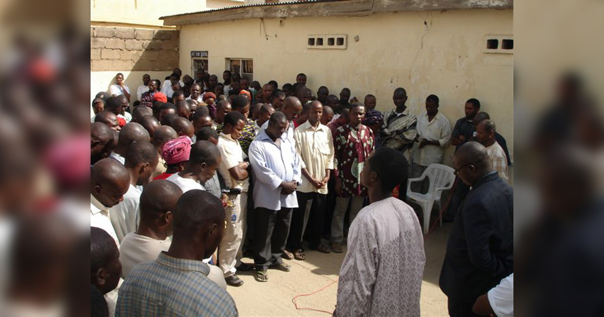 A group of people praying