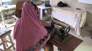 Rebecca at her sewing machine.