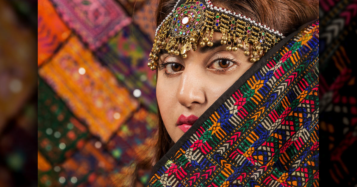 Young bride in colourful clothing