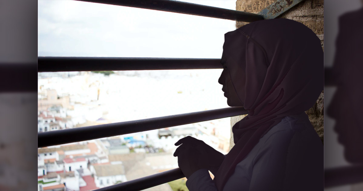 Woman by a window