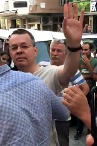 Andrew Brunson greeting people