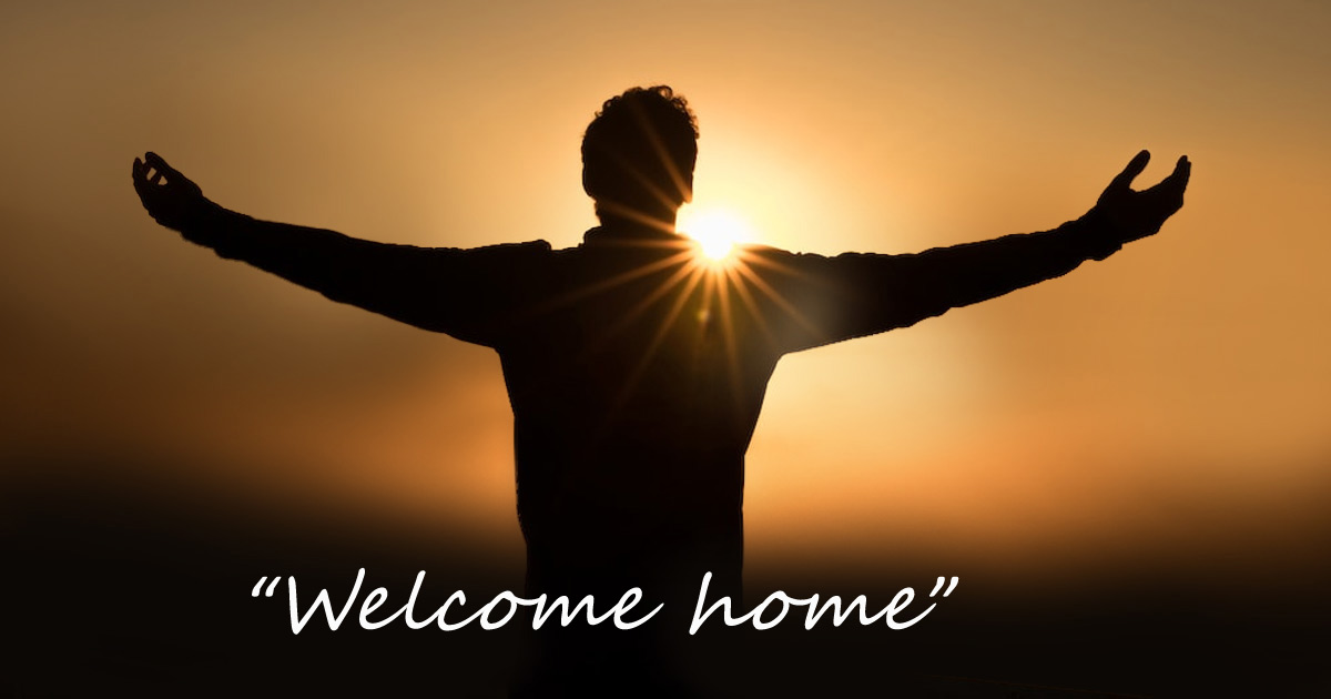 Man standing with arms extended, facing a brilliant light; words say, ''Welcome home.''